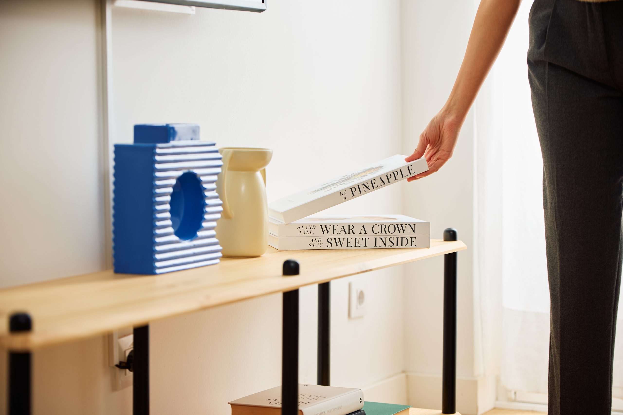 faux books for bookshelf styled with decorative accessories